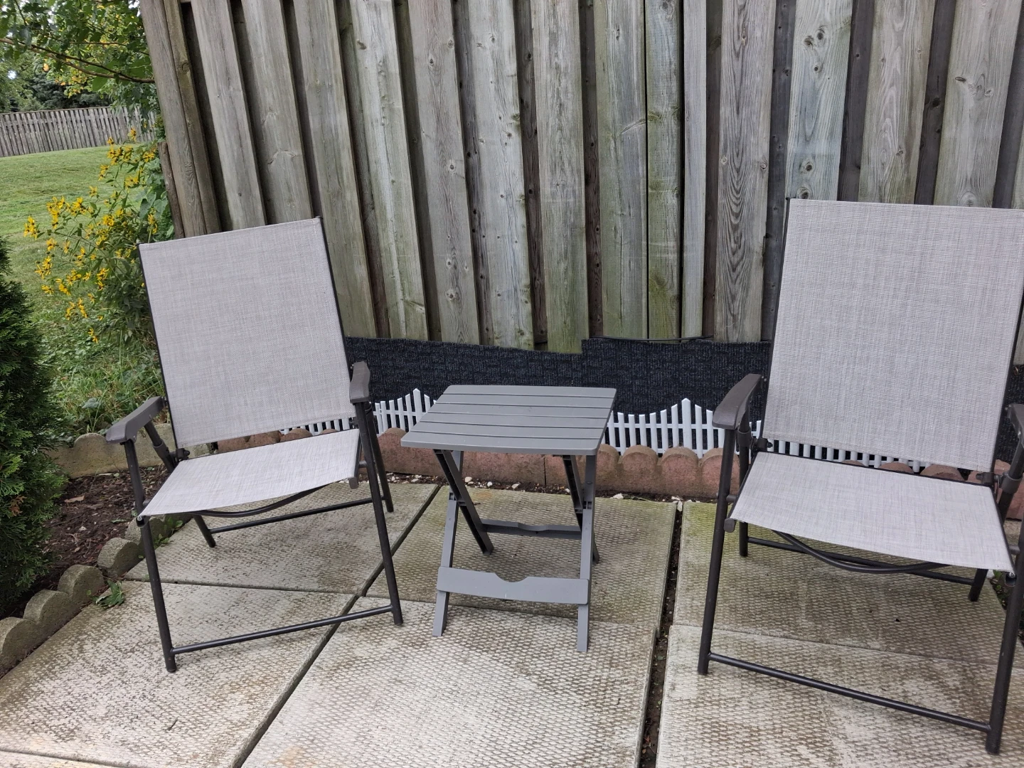 Red outdoor chair set with side table