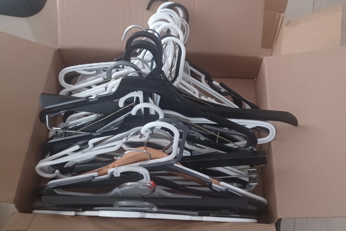 Assorted Coat Hangers (Plastic & Wood)