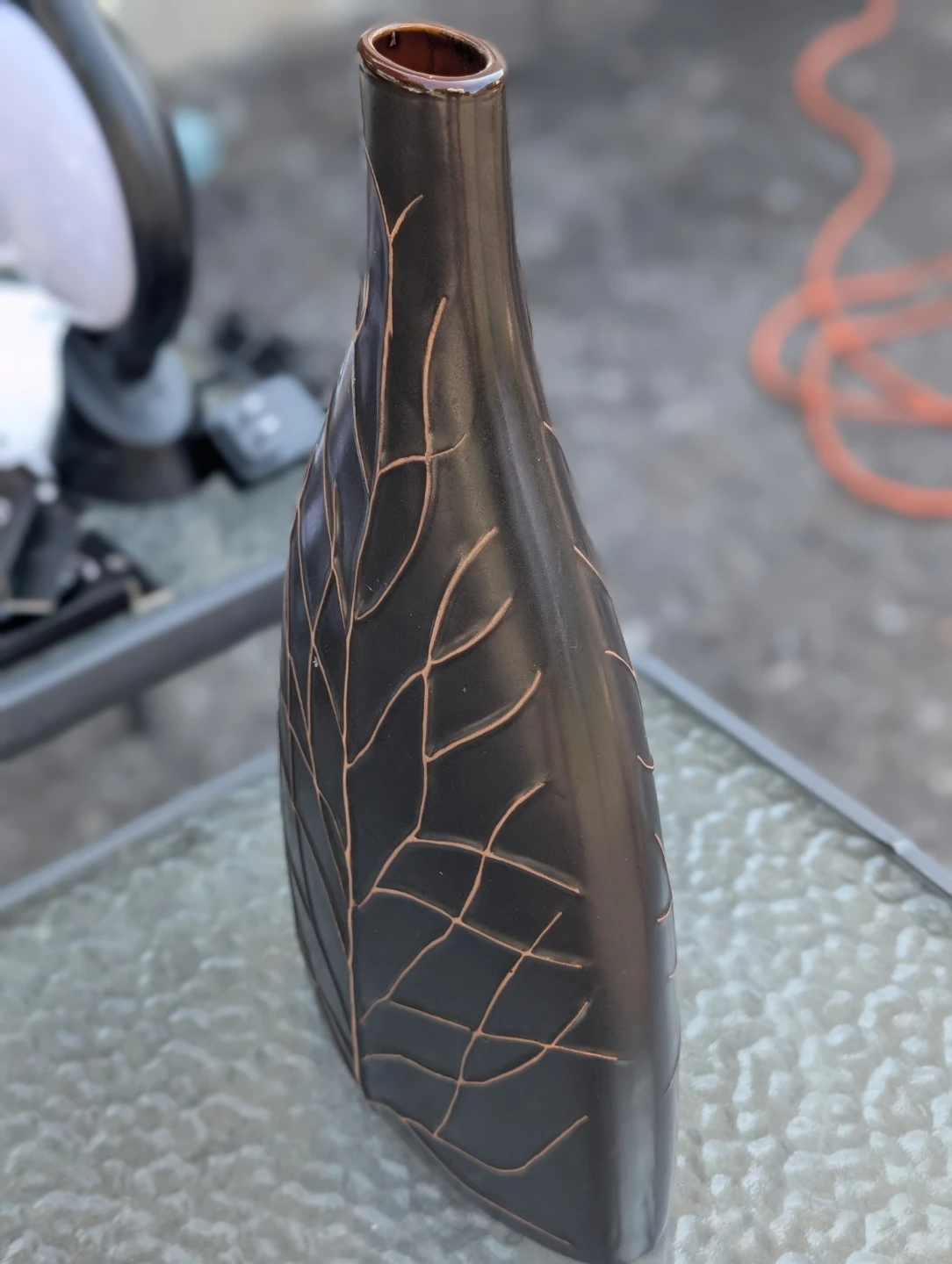 Brown decorative vase with leaf pattern