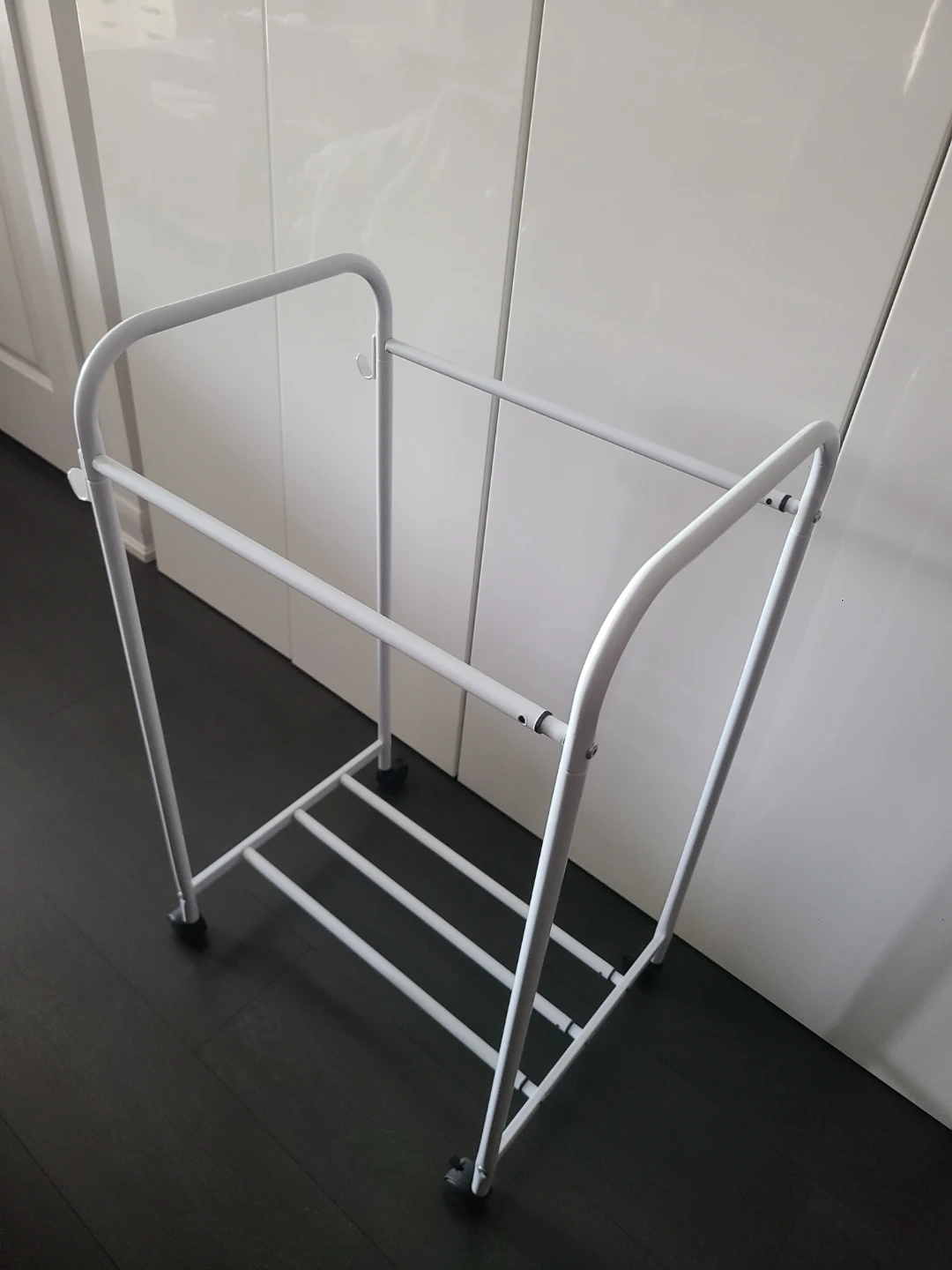 Expandable White Metal Rolling Clothes Rack