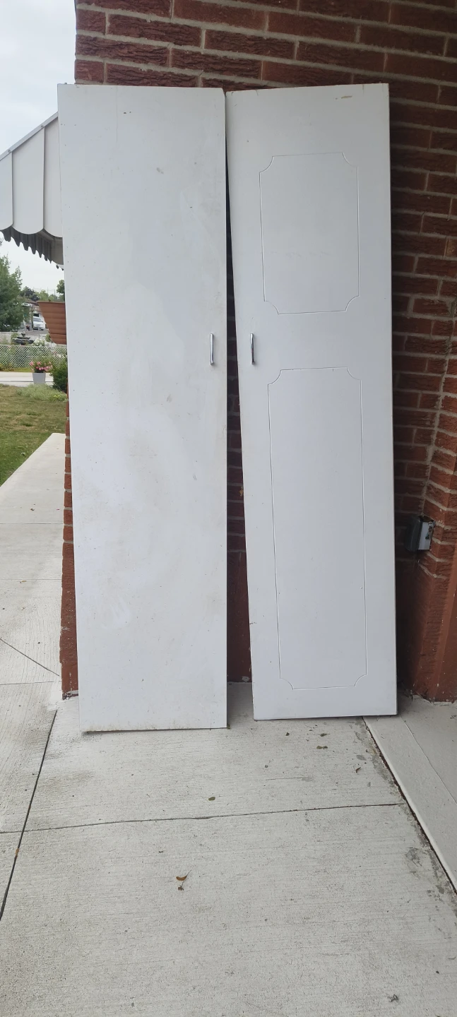 Three White Interior Pivotal Doors