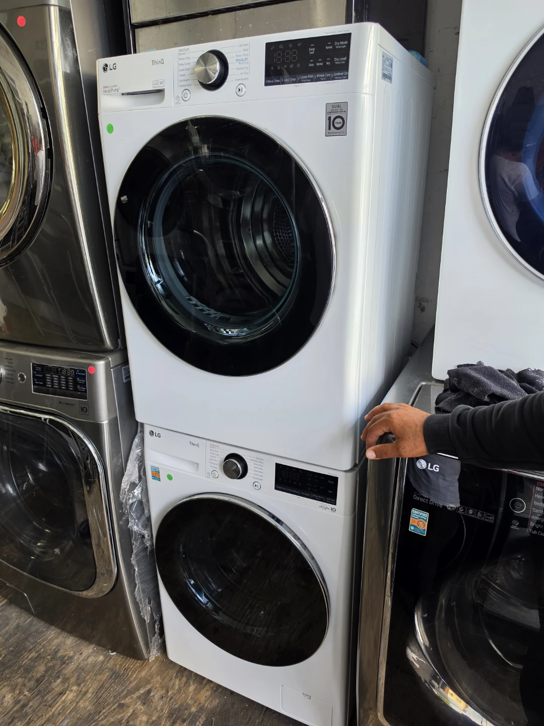 White 24in LG ThinQ Stacked Washer and electric Dryer Set