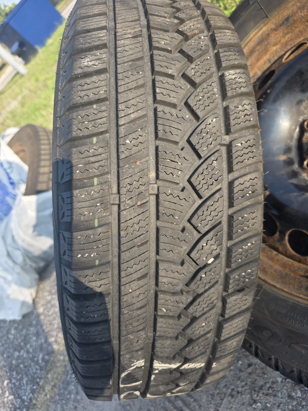 Set of 4 Chevrolet Hubcaps and 1 Spare Tire - photo 2