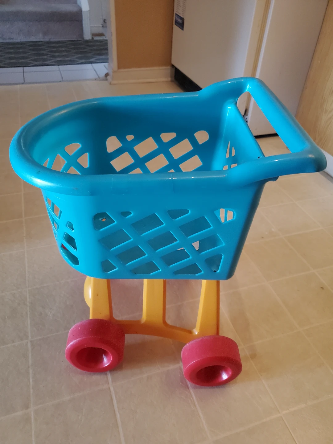 Blue and Yellow Toy Shopping Cart