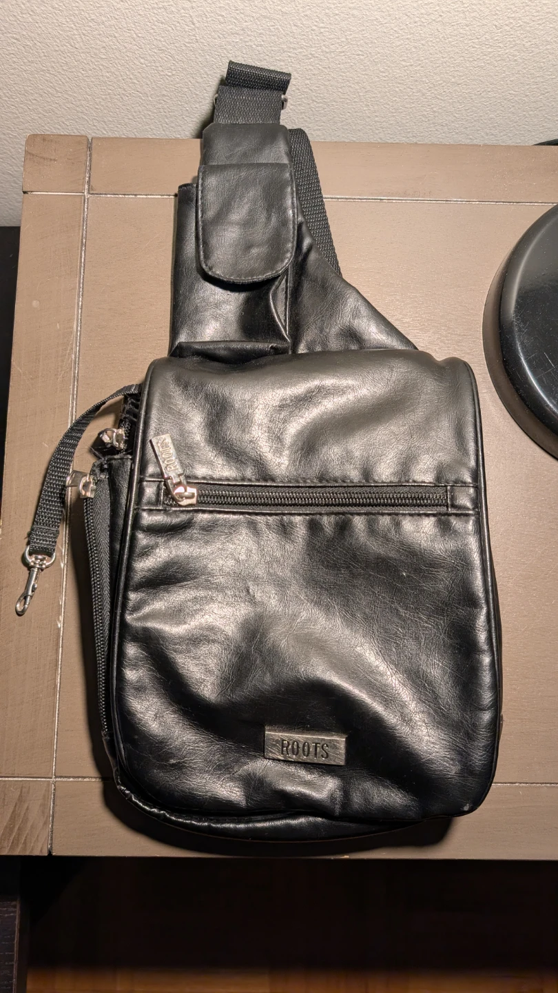 Roots Black Faux Leather Sling Bag