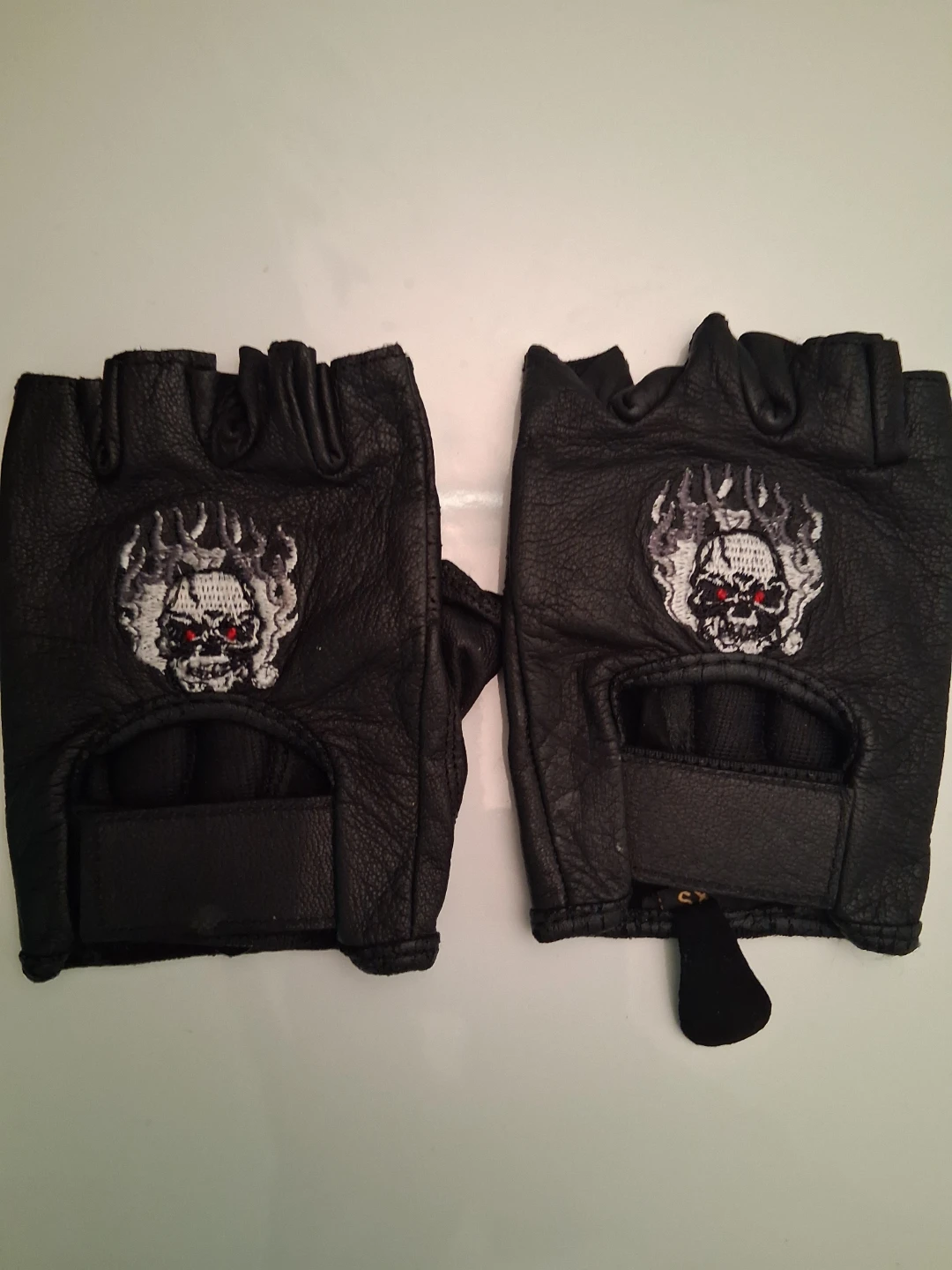 Black Leather Fingerless Gloves with Skull Design