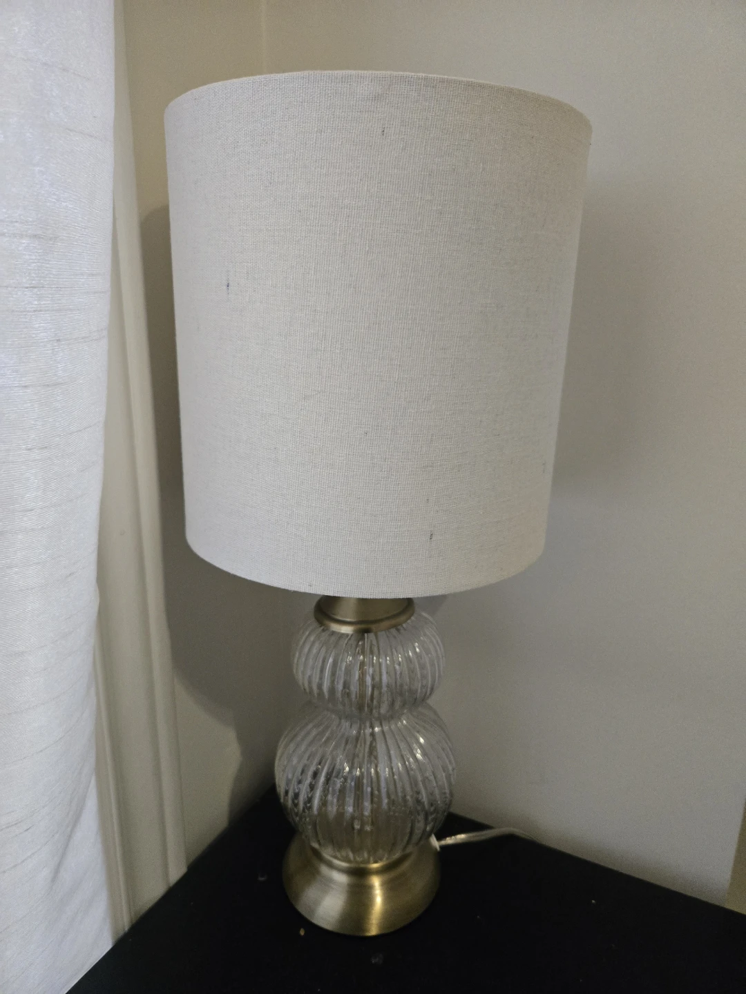 Clear Glass Lamp with Gold Accent and White Circular Shade