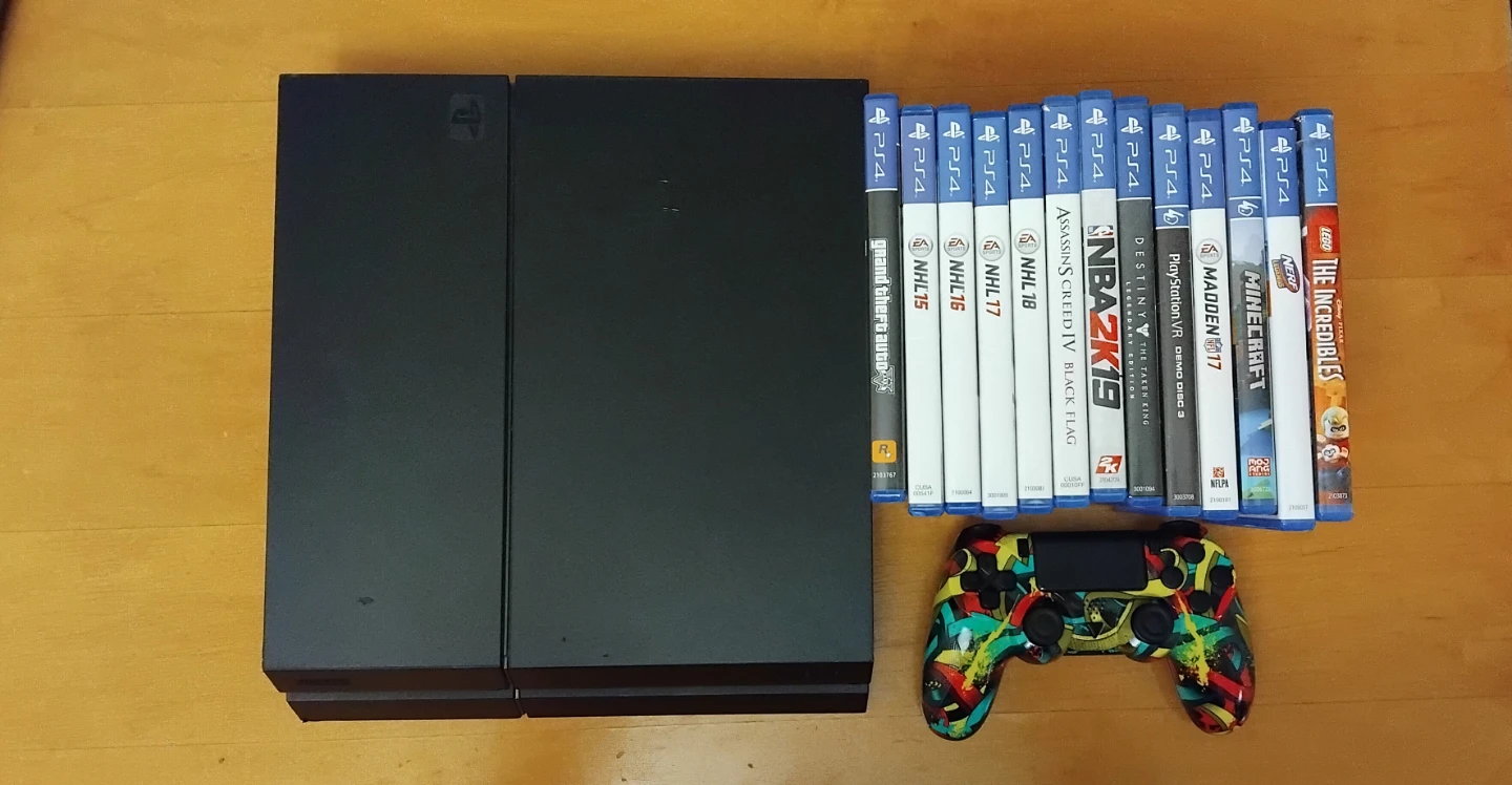 PlayStation 4 Console with Games and Controller