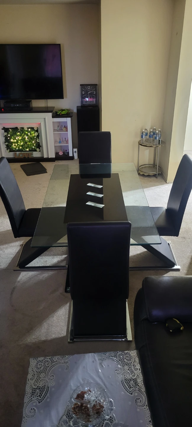 Tempered Glass Dining Table with 4 Black Faux Leather Chairs