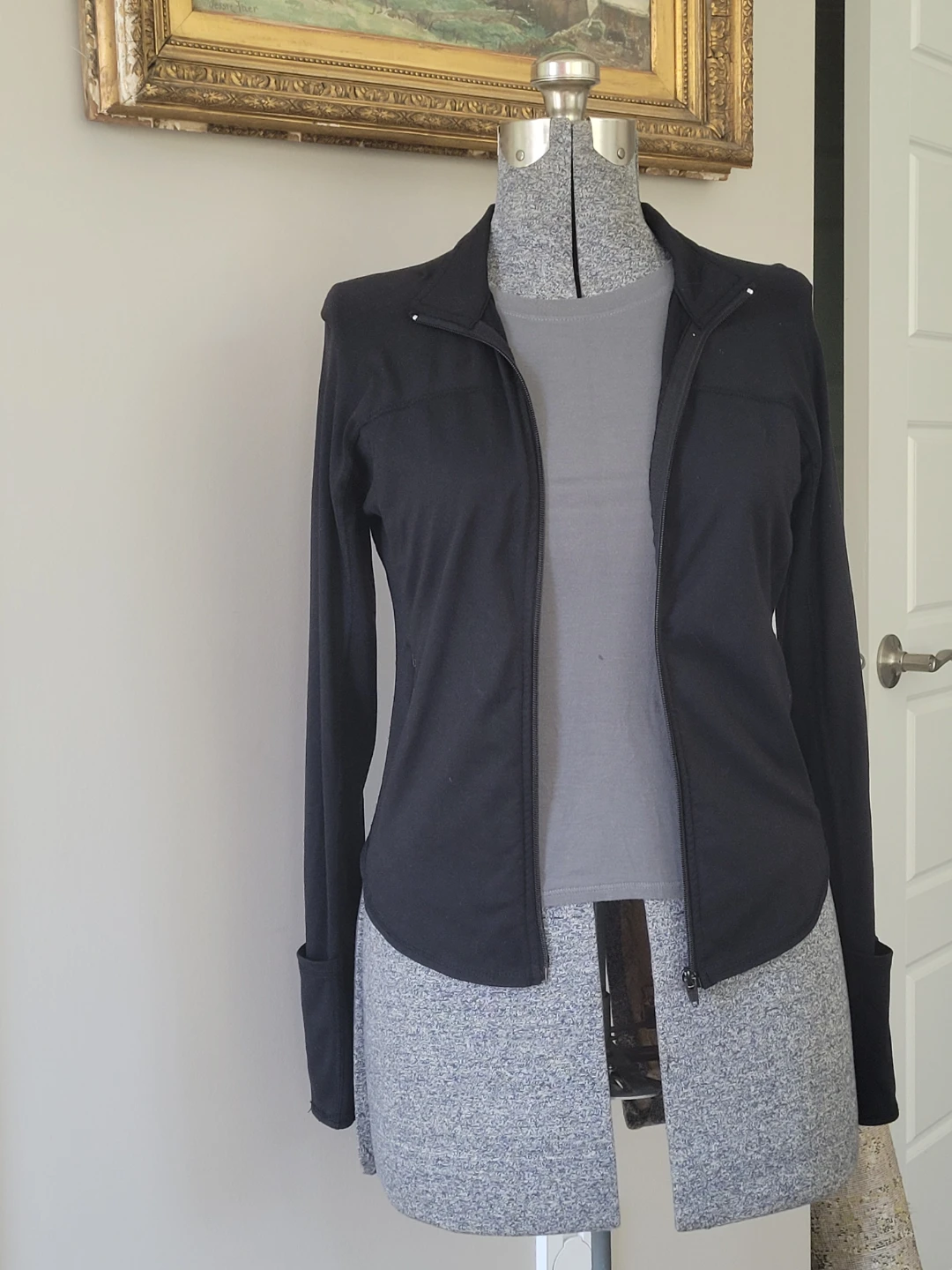 Women's black zip-up jacket