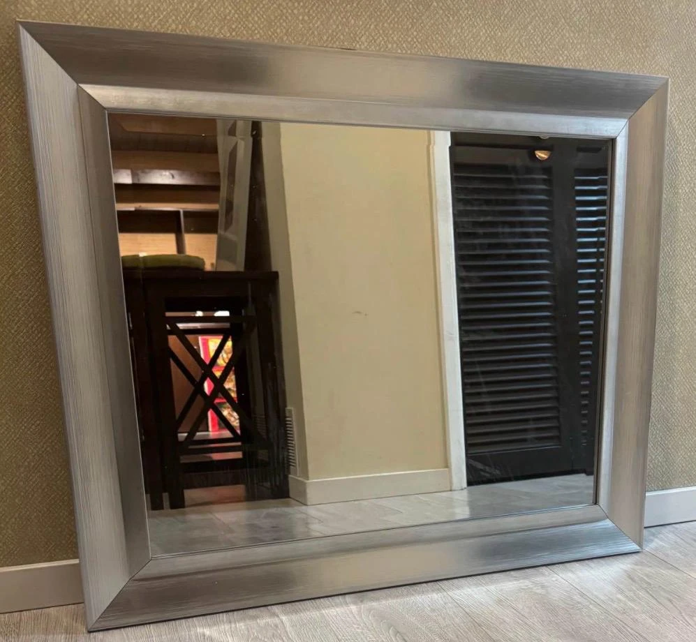 Large silver framed wall mirror