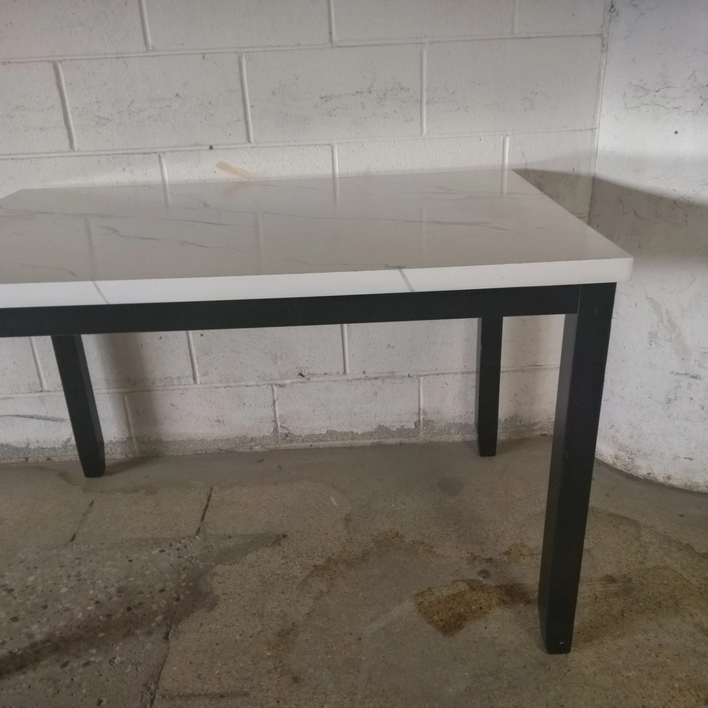 White Marble Top Dining Table with Black Legs