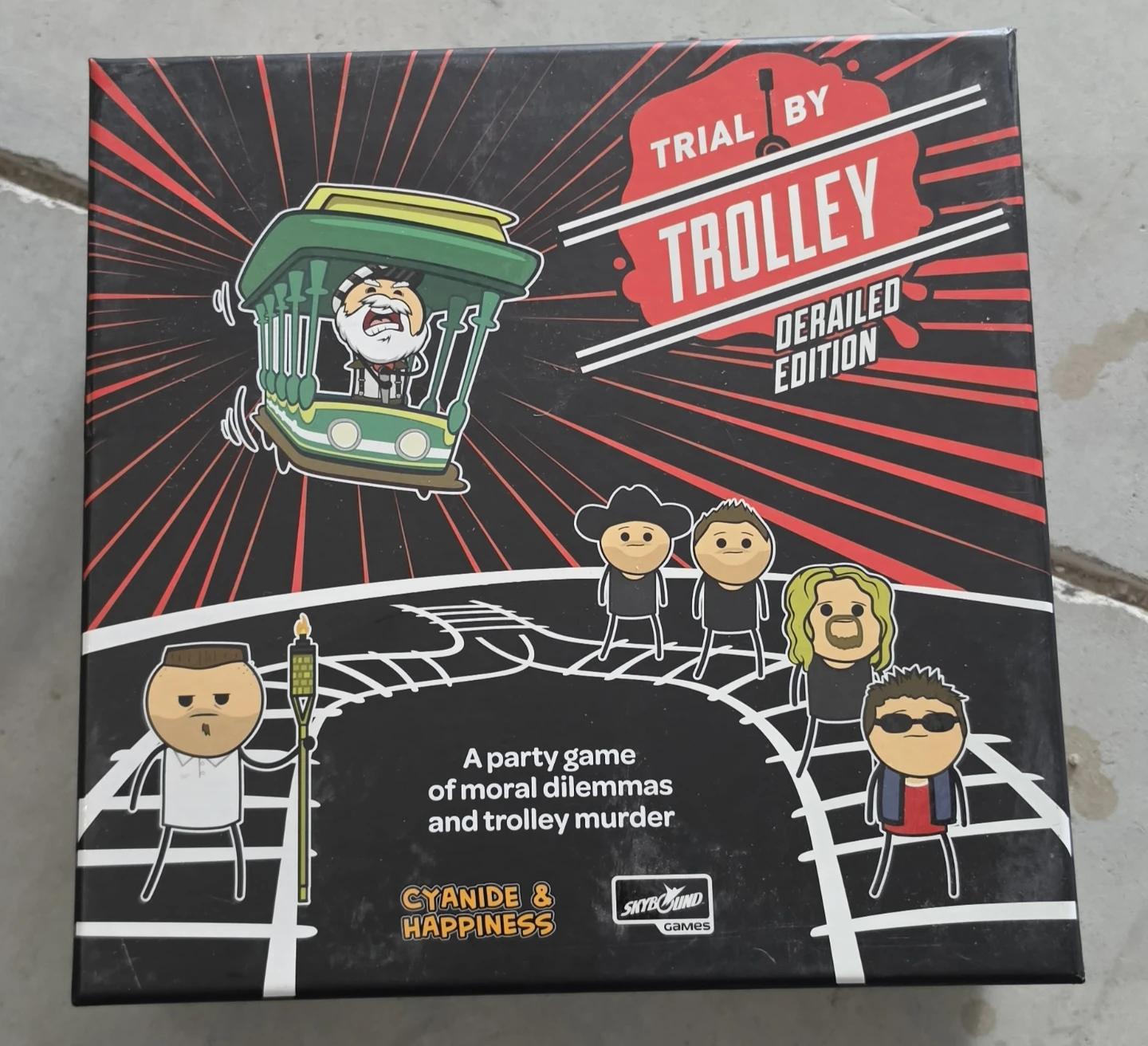 Cyanide & Happiness Trial by Trolley Derailed Edition Party Game