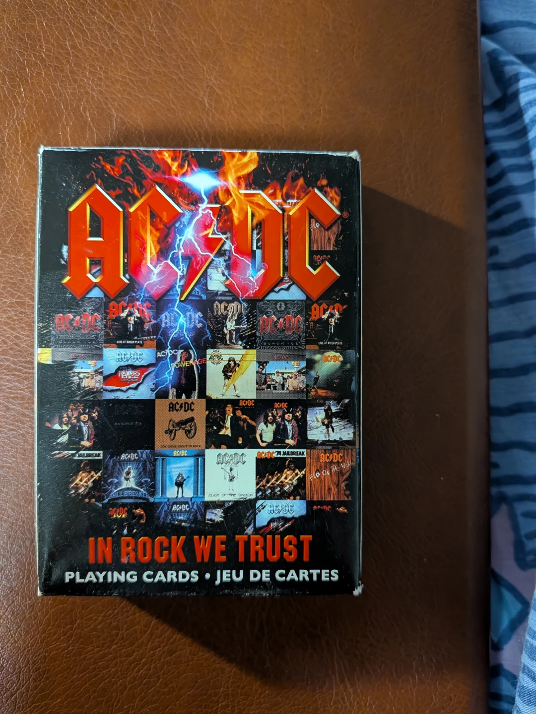 Ac/dc card game playing cards