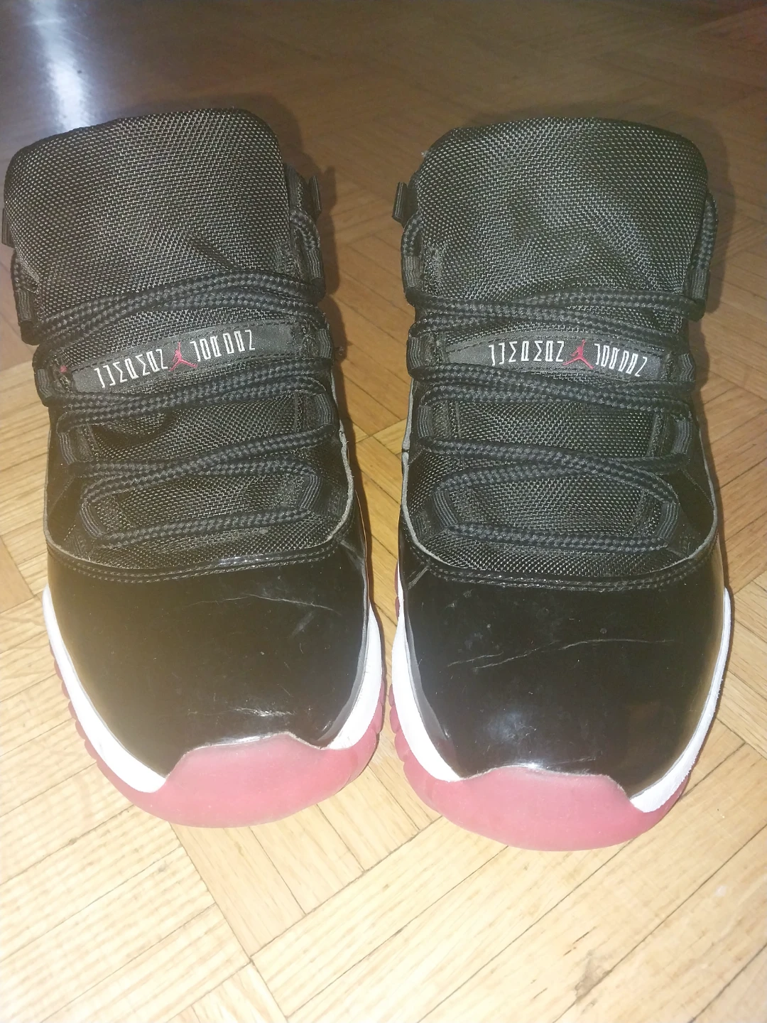 Jordan 11 Retro Black Red Sneakers - photo 2