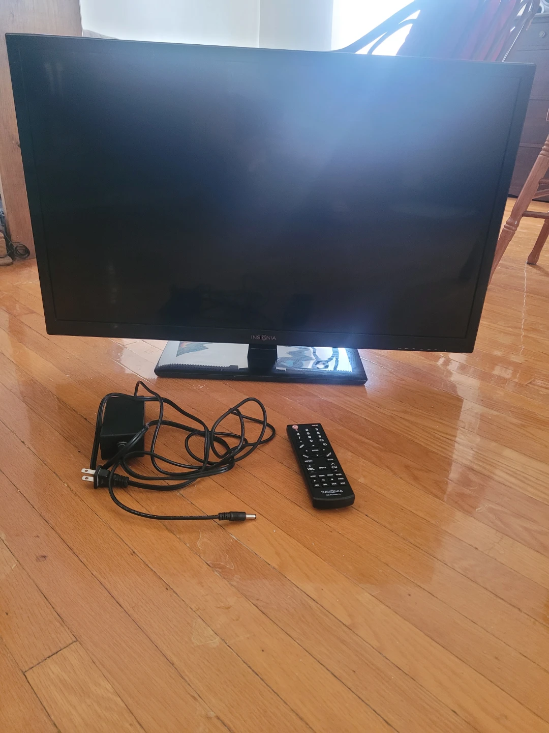 Insignia TV with Remote and Power Adapter
