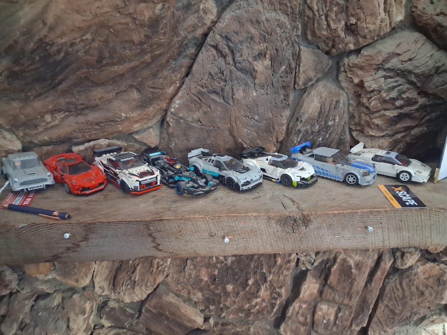 Collection of LEGO Speed Champions and other building block cars