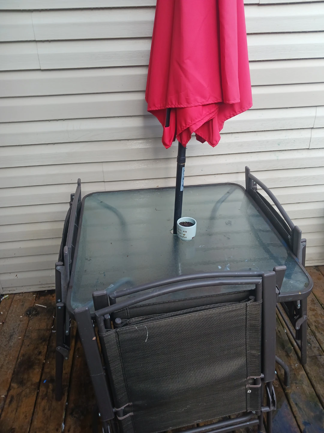 Glass Top Patio Table with Chairs and Umbrella