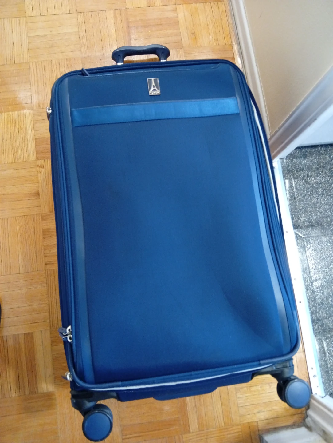 Travelpro Navy Blue Suitcase