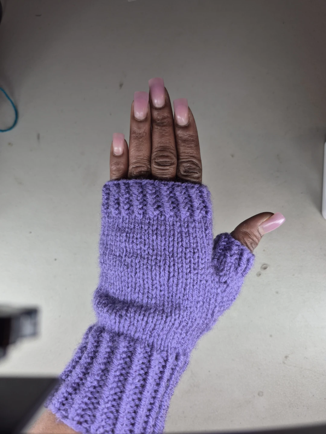 Women's knitted fingerless gloves