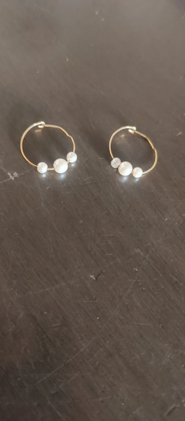 Gold hoop earrings with pearls