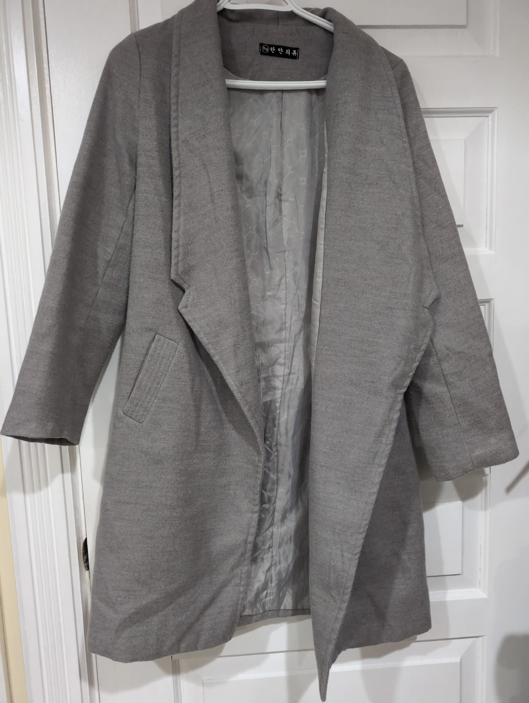 Grey mid-length coat with wide lapels