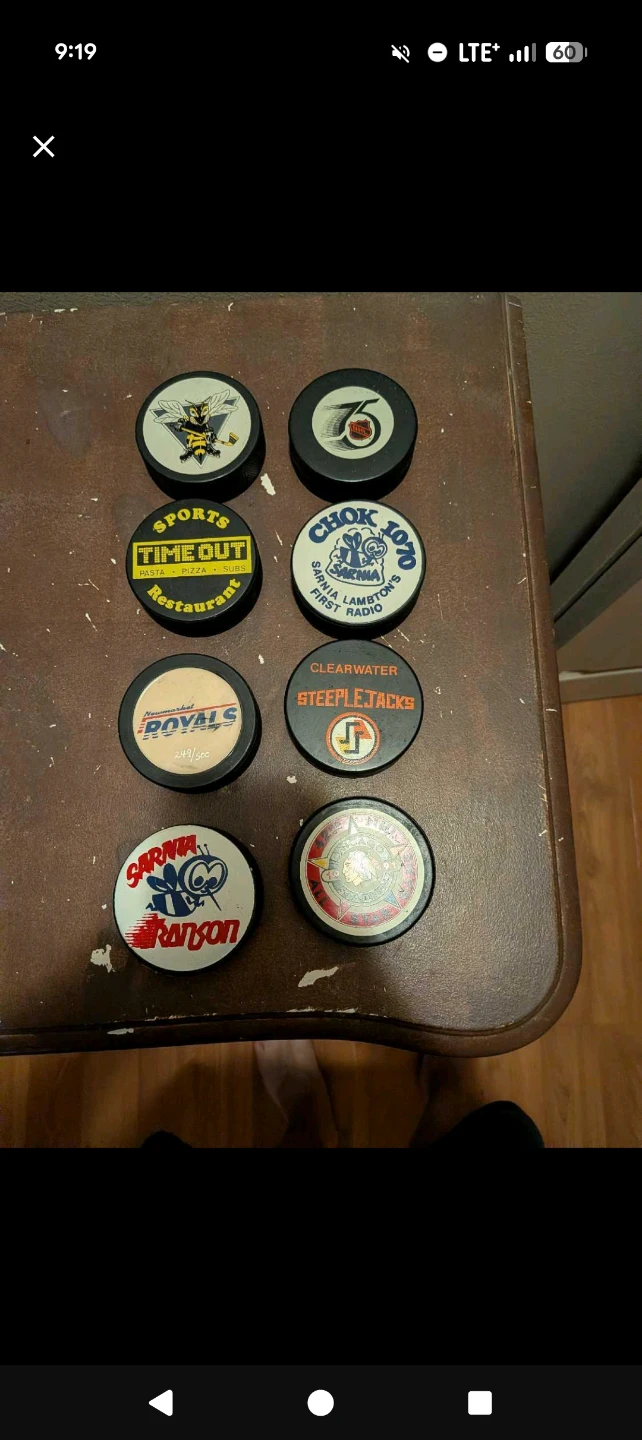 Collection of 8 Vintage Hockey Pucks