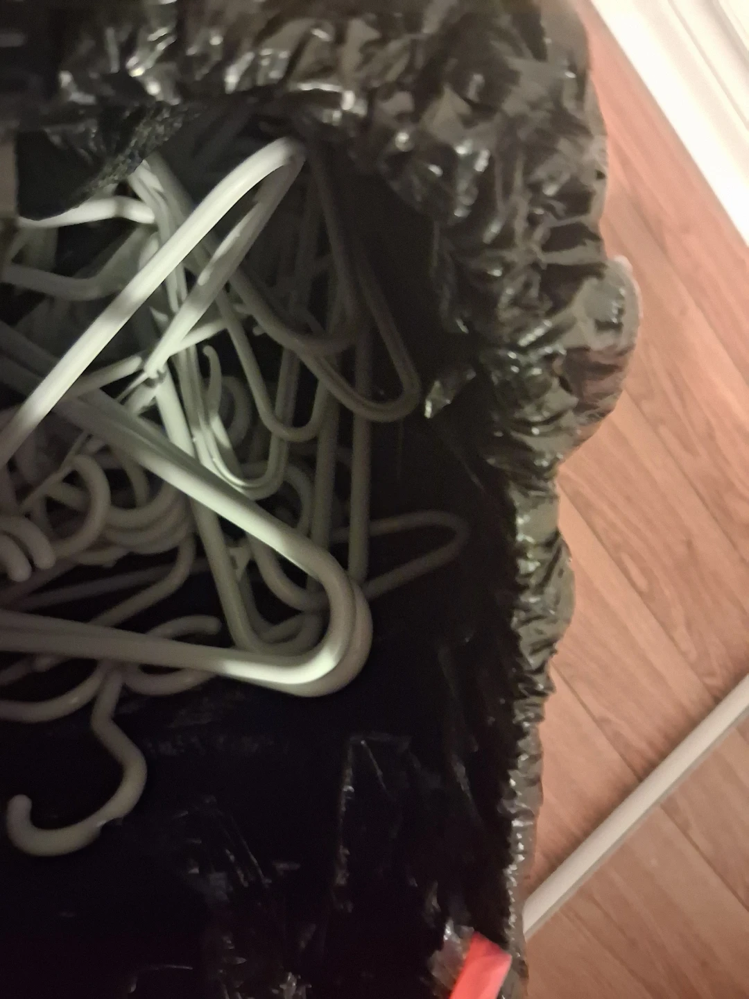 Bundle of White Plastic Hangers