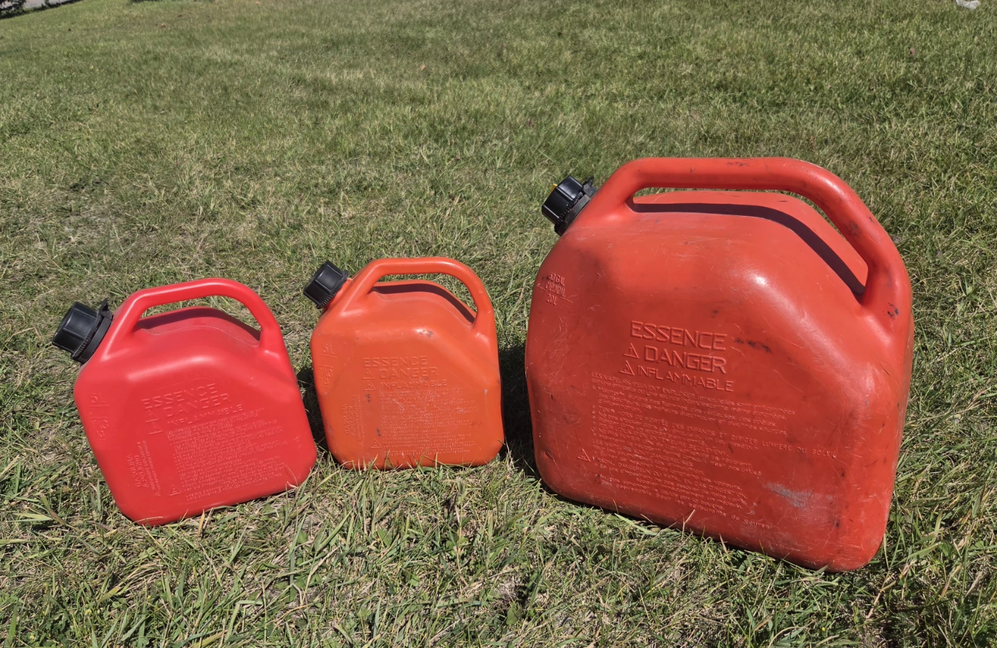 Three Red & Orange Gas Cans -All 3  for $30