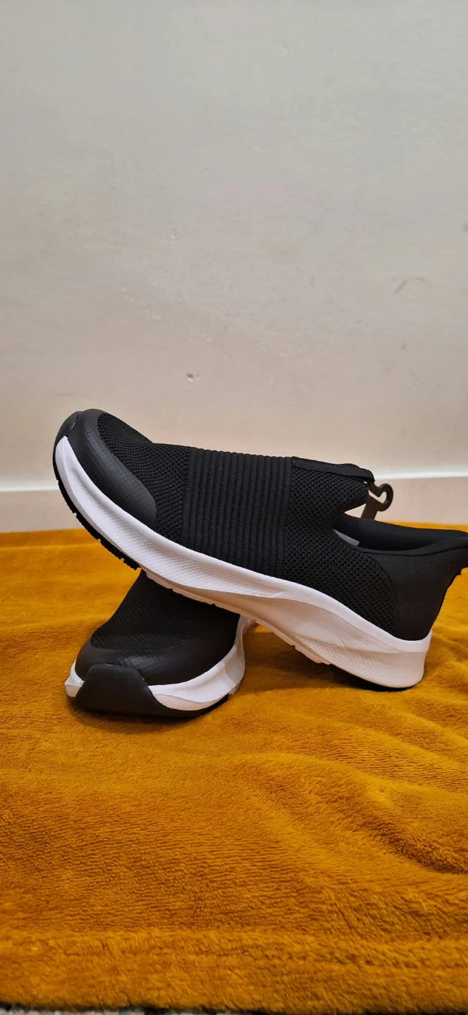 Black slip-on sneakers