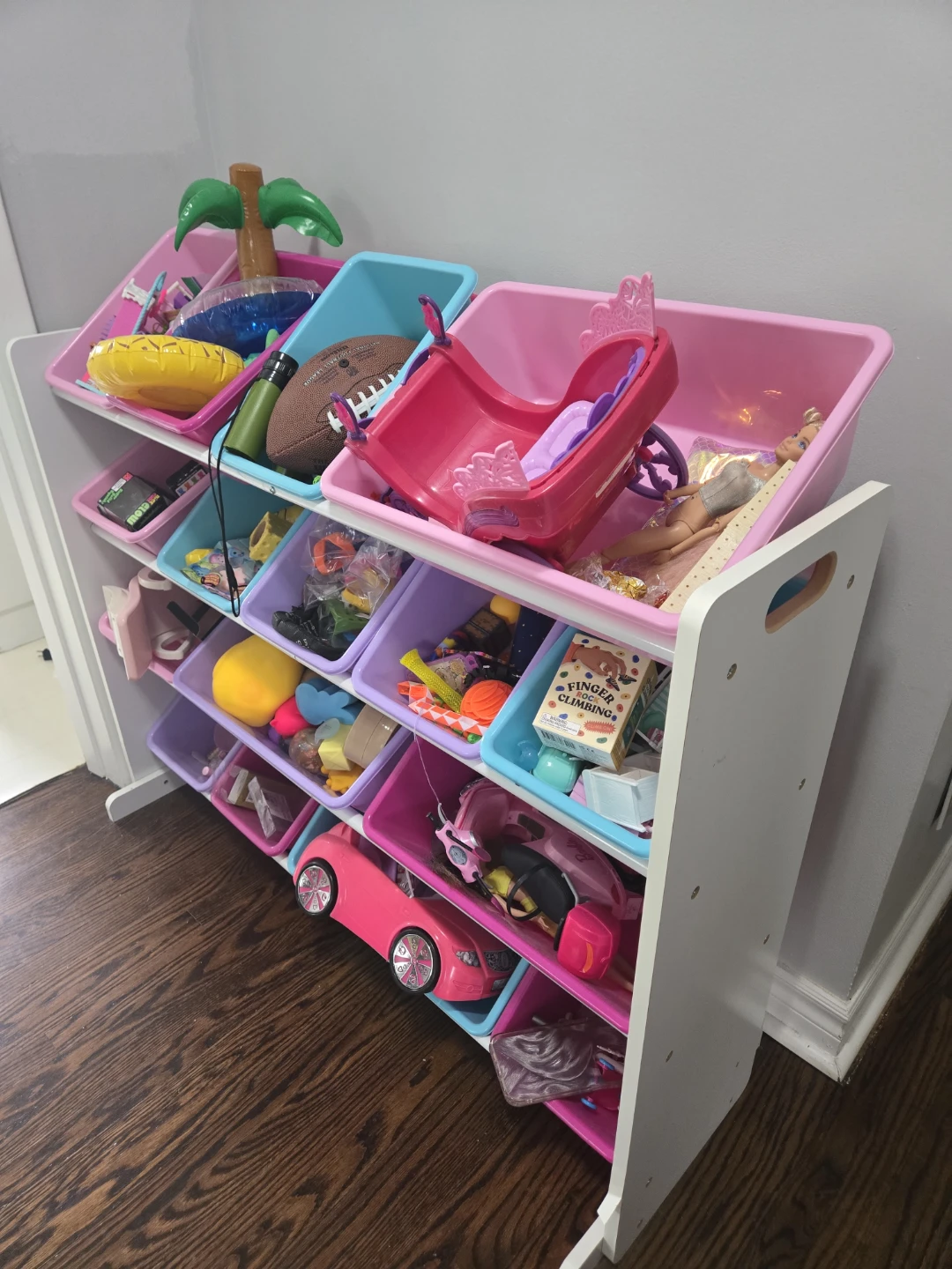 IKEA kids storage organizer with 16 colorful plastic bins