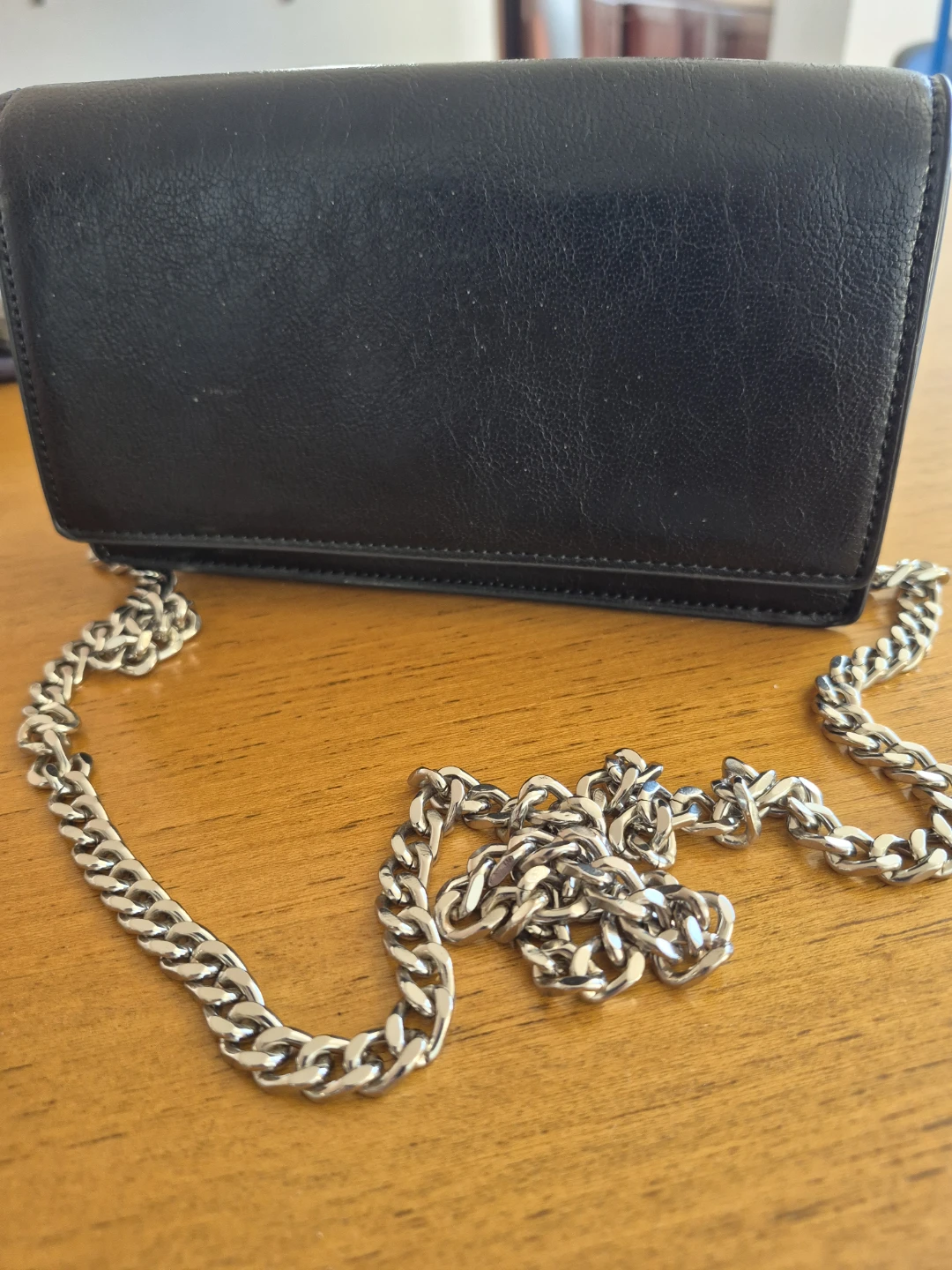 Black clutch with chain strap