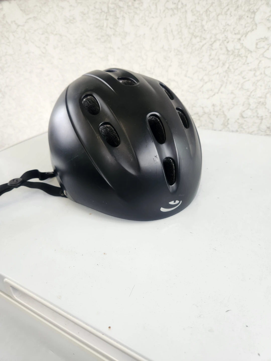 Black mens biking helmet.