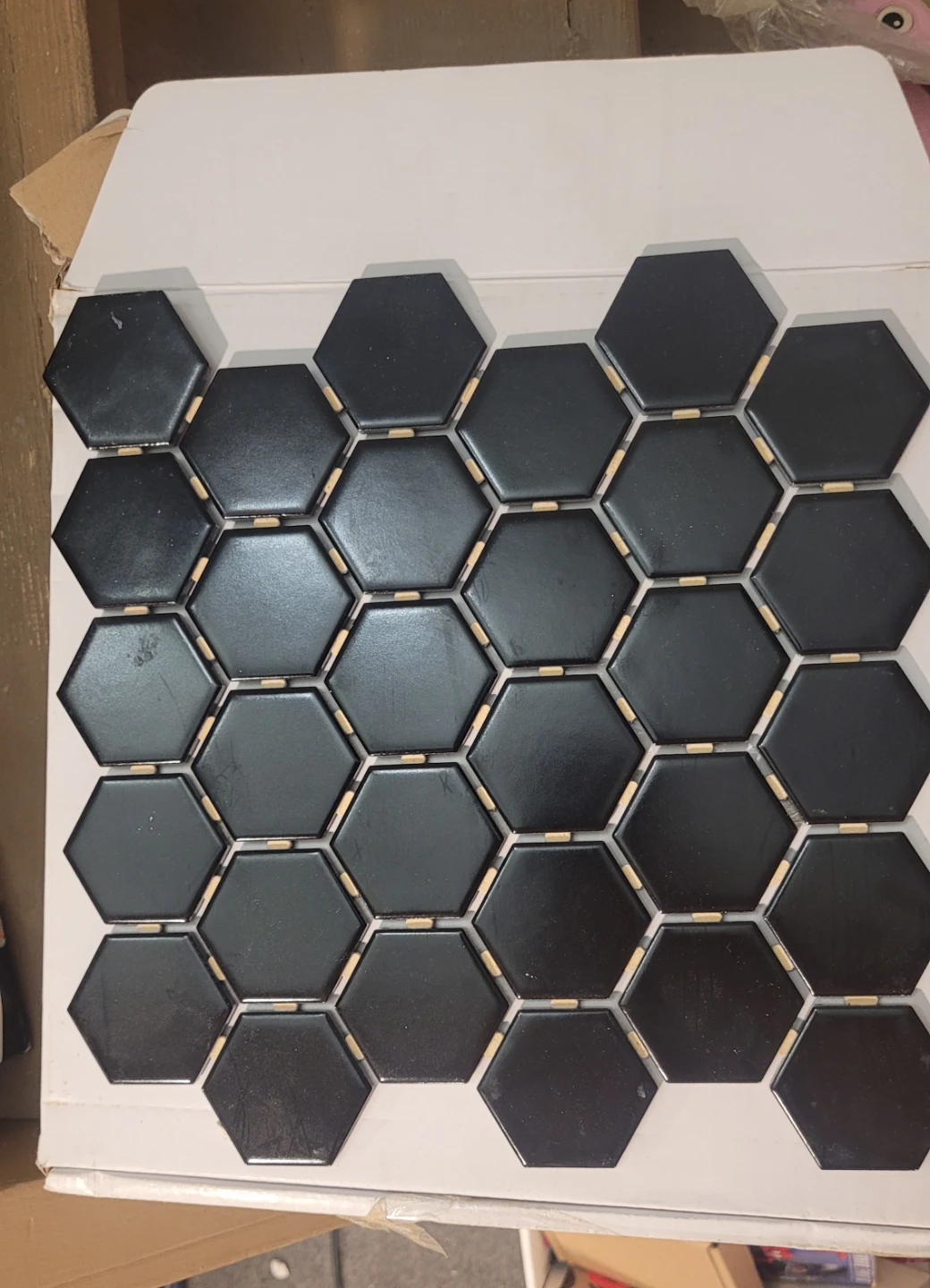 Free box of black hexagon tiles