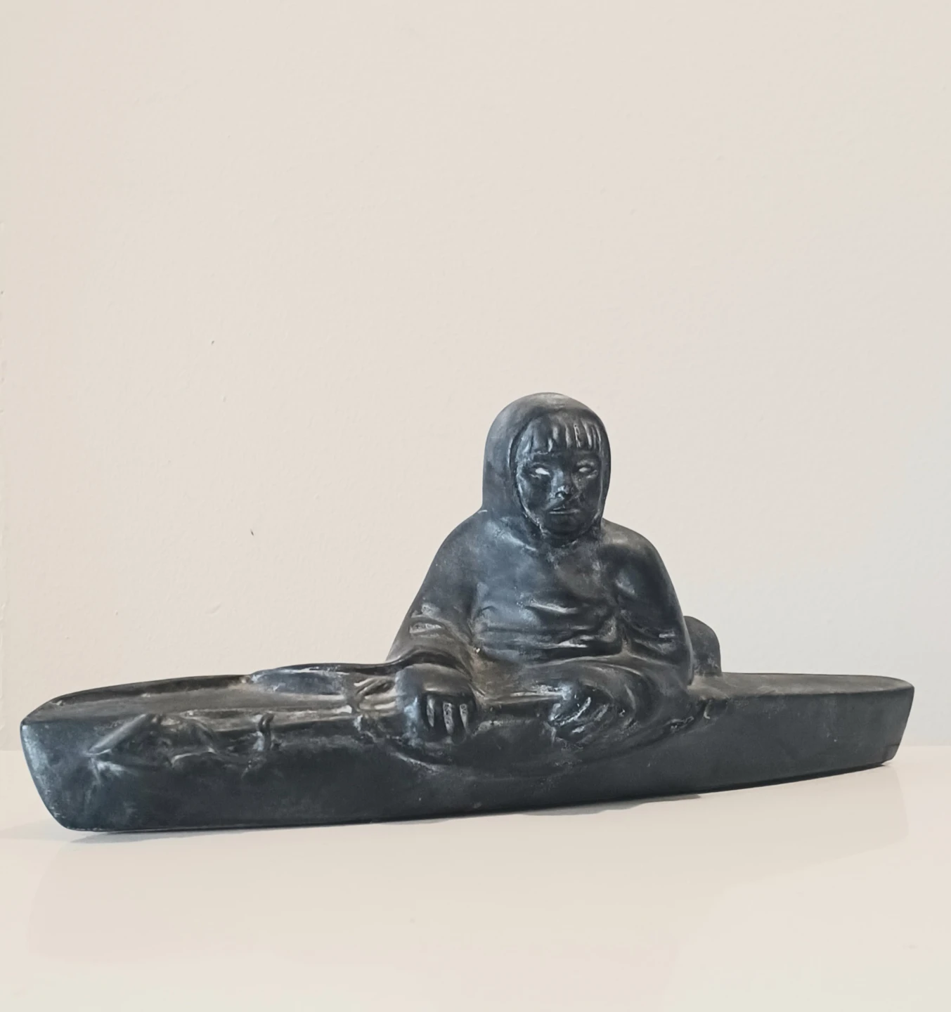 Unique Inuit Hand Carved Stoneware Seal Hunter Kayak Statue