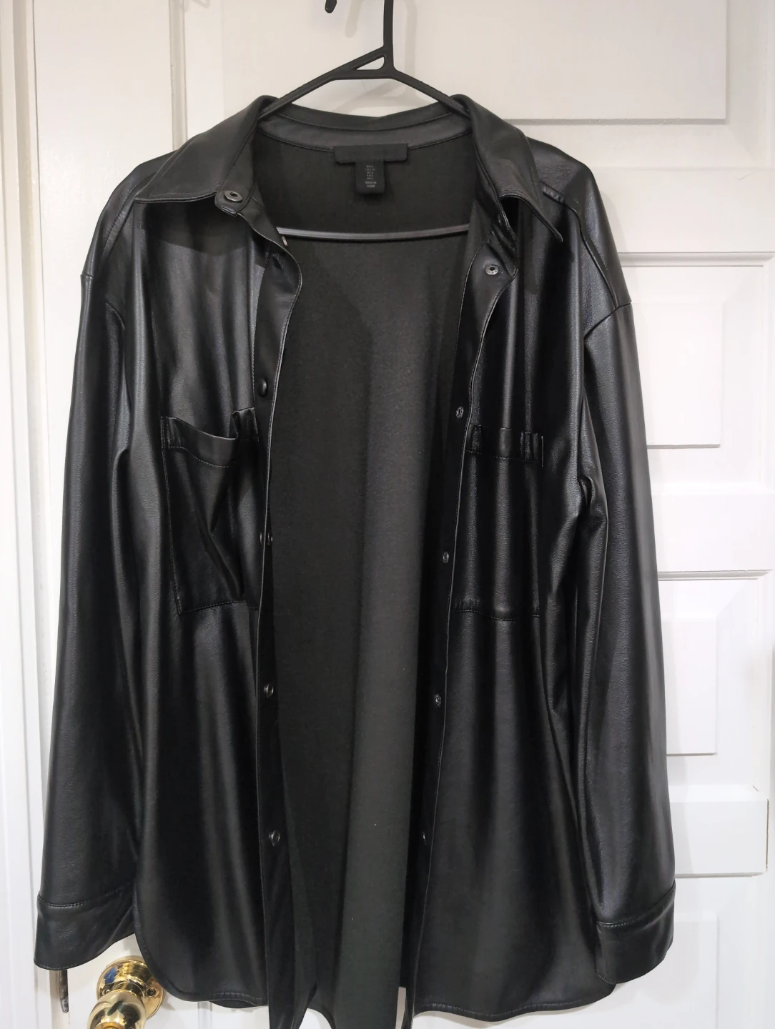 Black faux leather button down shirt jacket