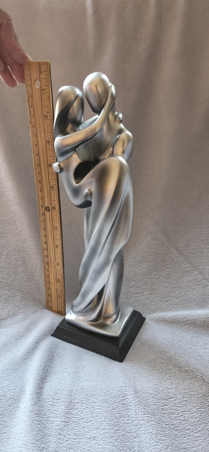 Abstract Silver Couple Figurine on Black Base