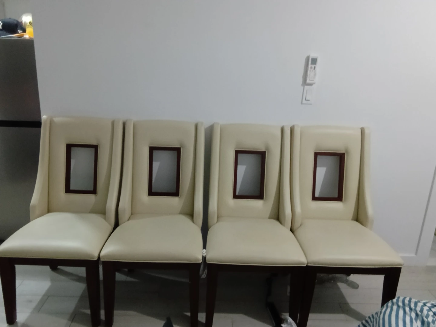 Set of 4 Cream Upholstered Dining Chairs with Cutout Back