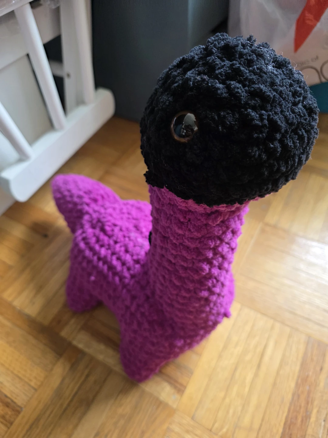 Crocheted Purple Dinosaur plush