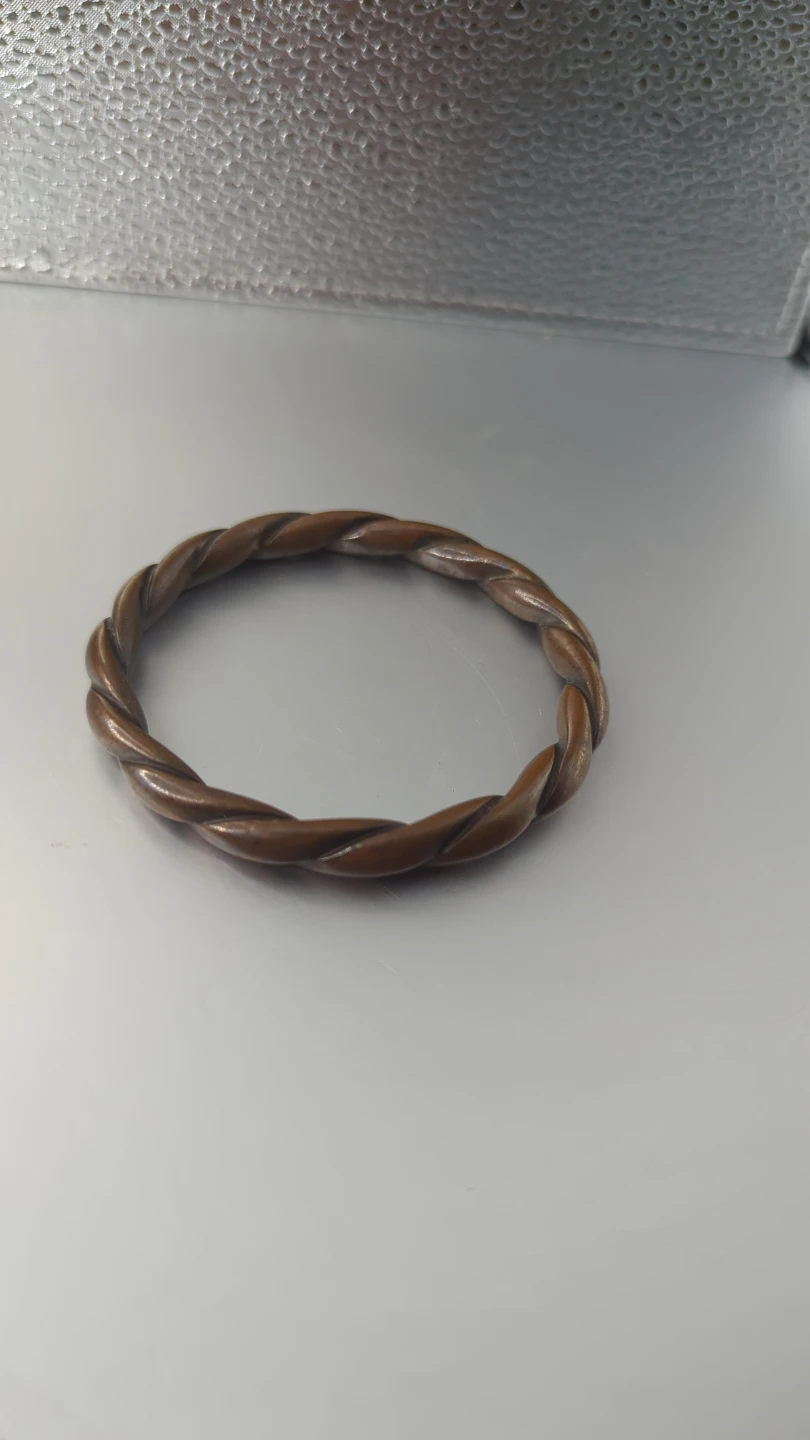 Hollow copper twisted bangle