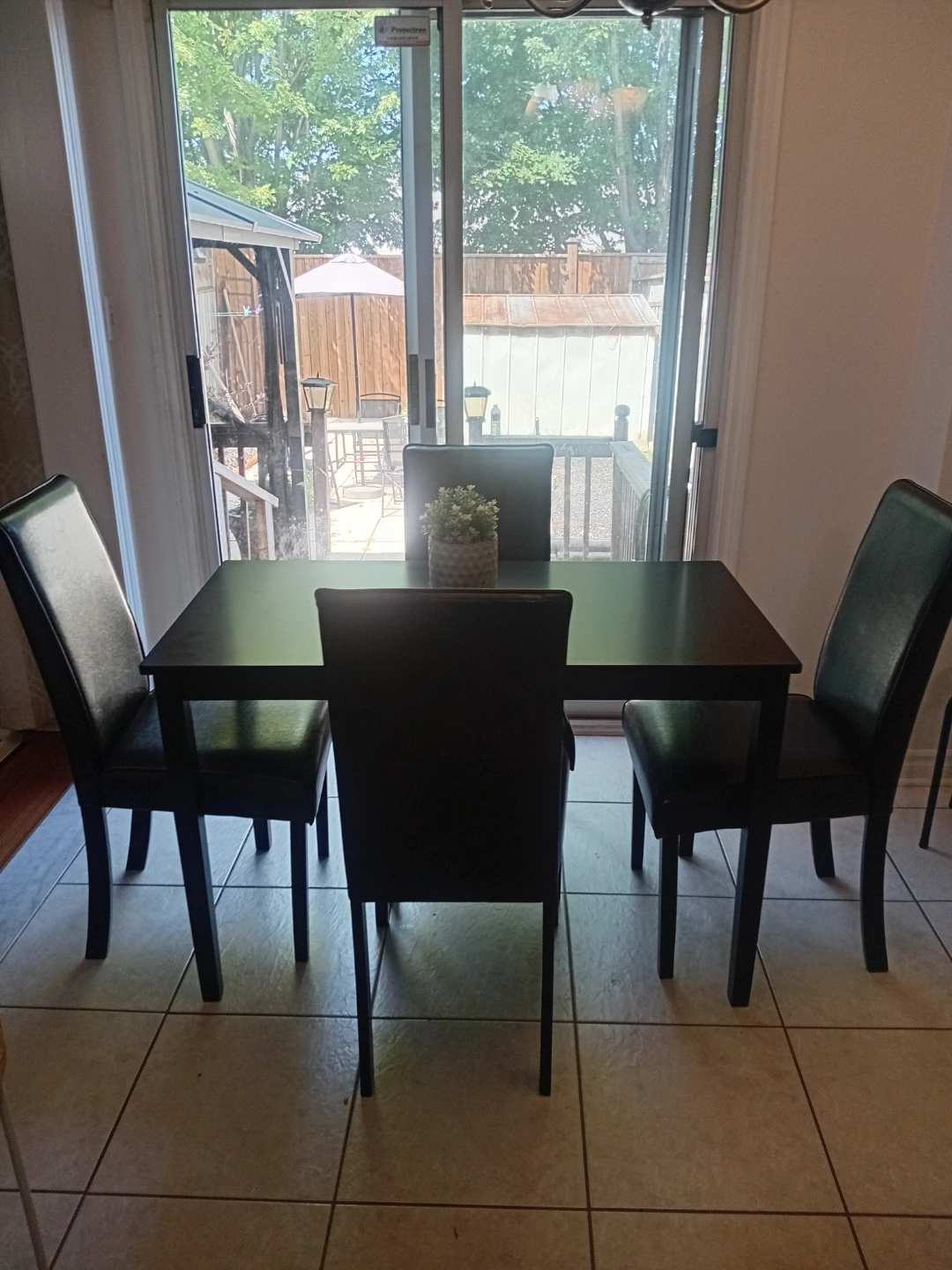 Solid wood black table and 4 upholstered chairs - photo 2
