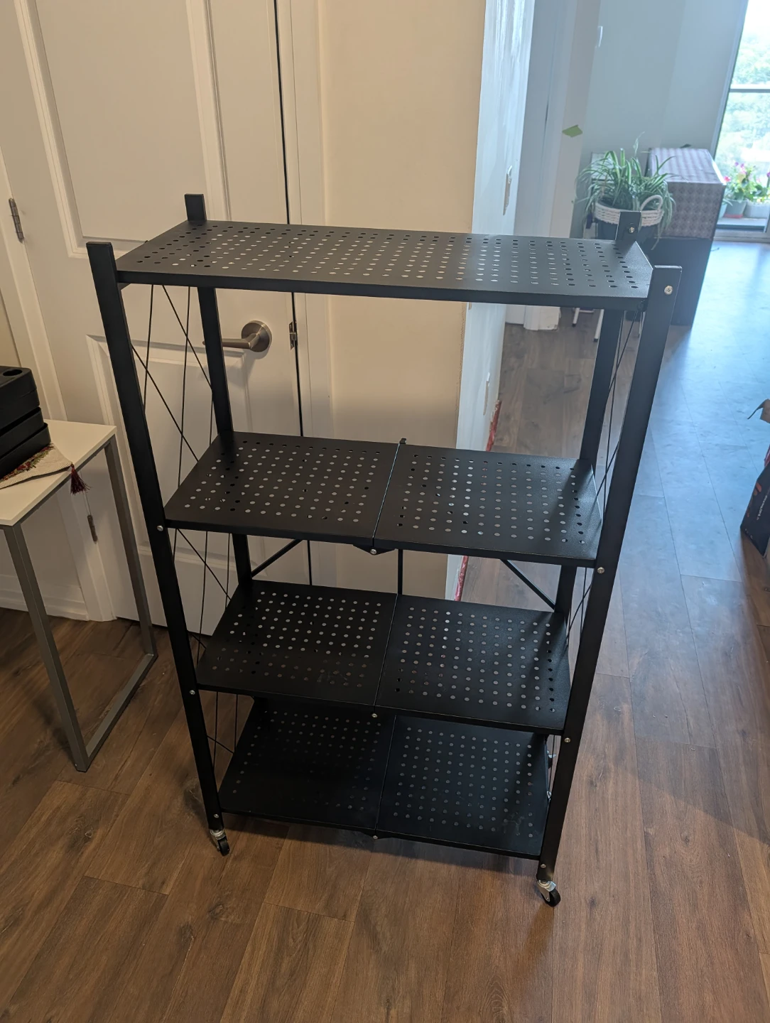 Black Metal 4-Tier Folding Shelf Unit with Wheels