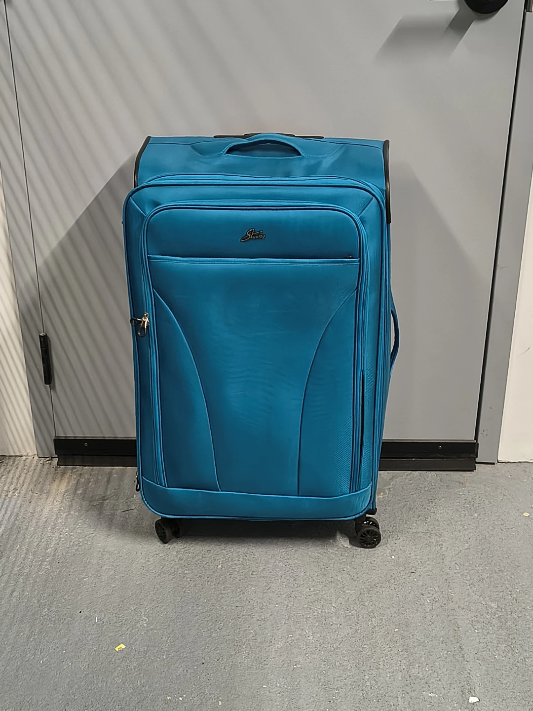 XL Skyway Teal Softside 4 Wheel Spinner Suitcase
