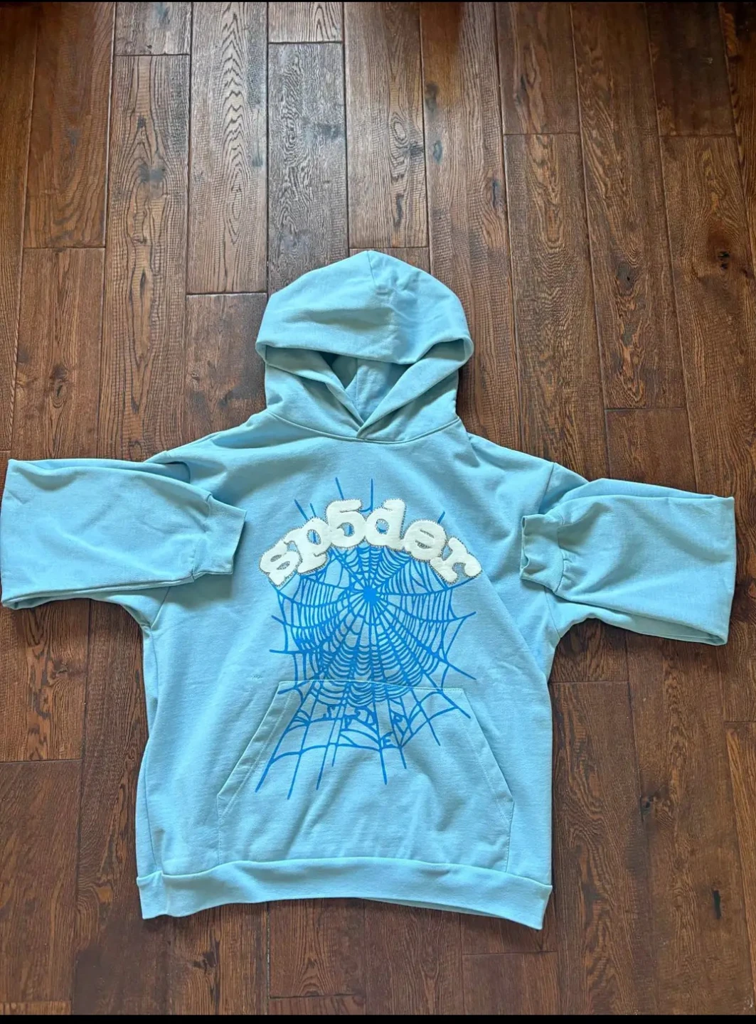 SP5DER hoodie light blue spider web graphic