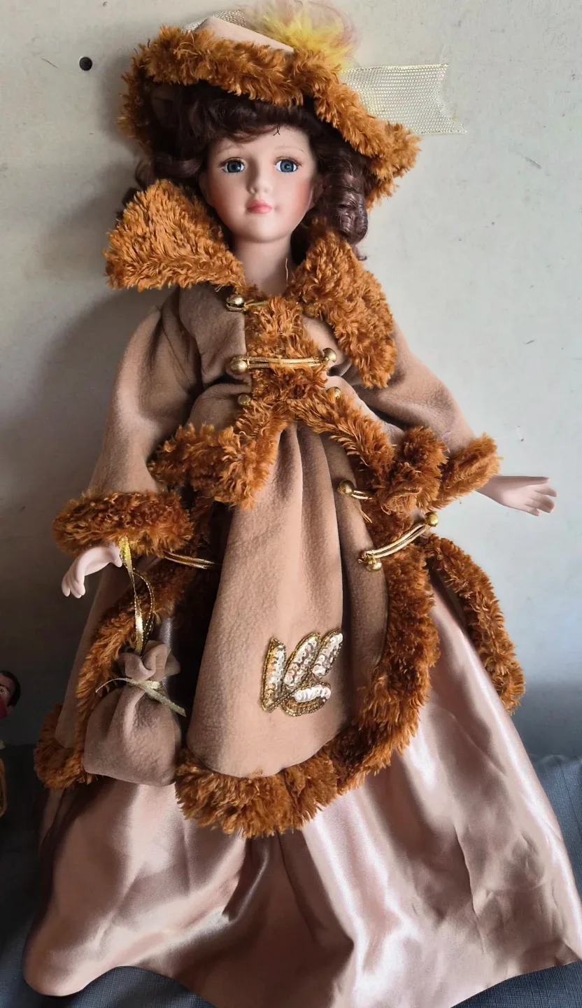 Decorative Porcelain Doll with Winter Outfit