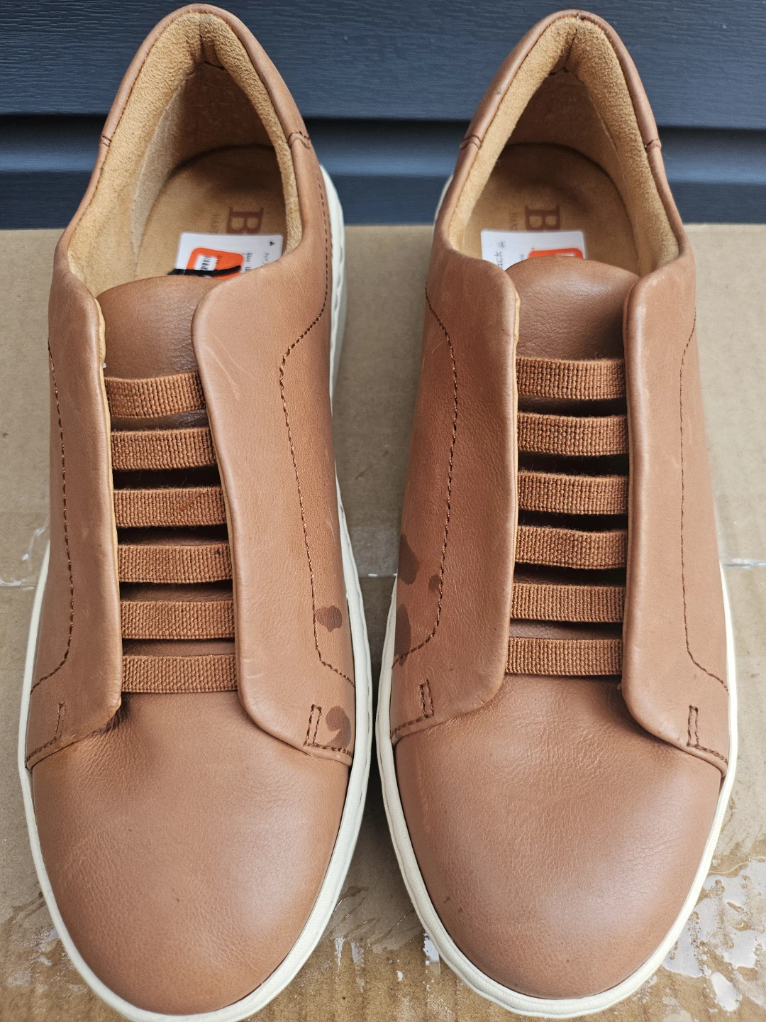 Born Slip-On Leather Sneakers