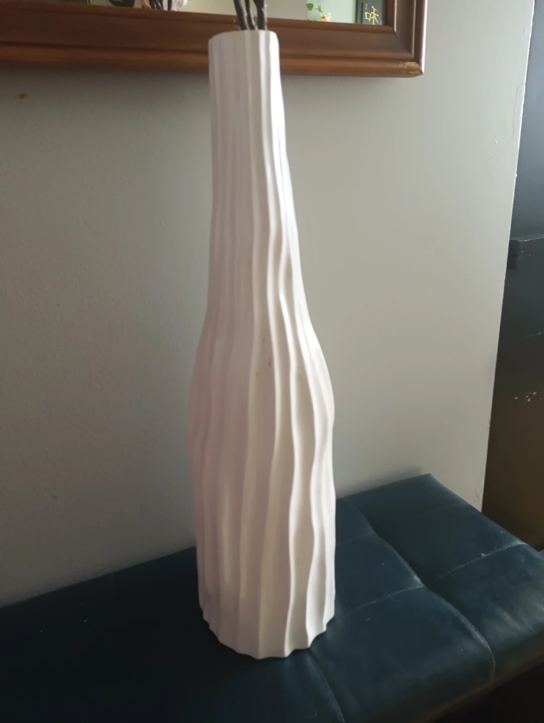 Tall ribbed white vase