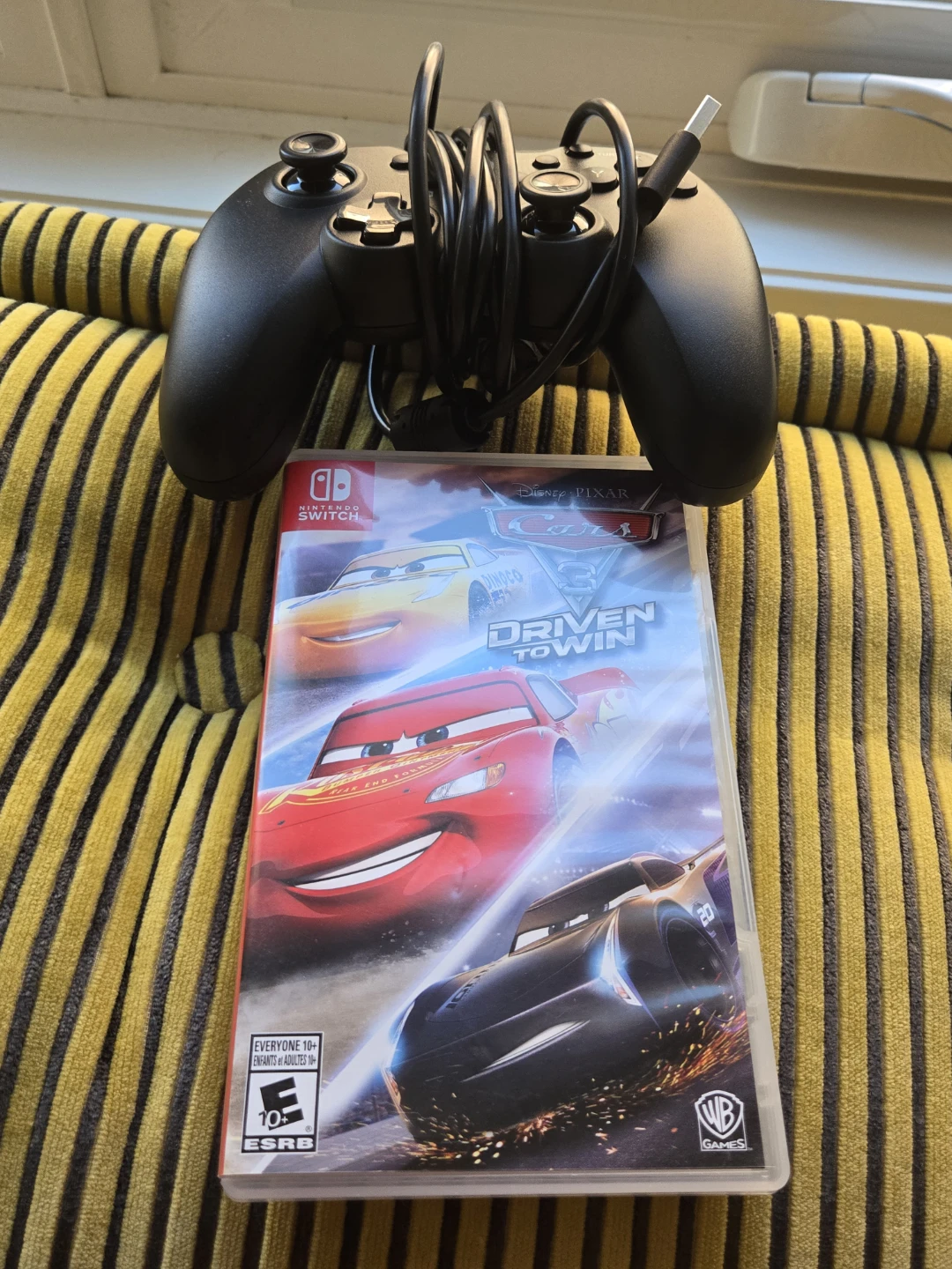 Nintendo Switch Game Controller and Cars 3: Driven to Win