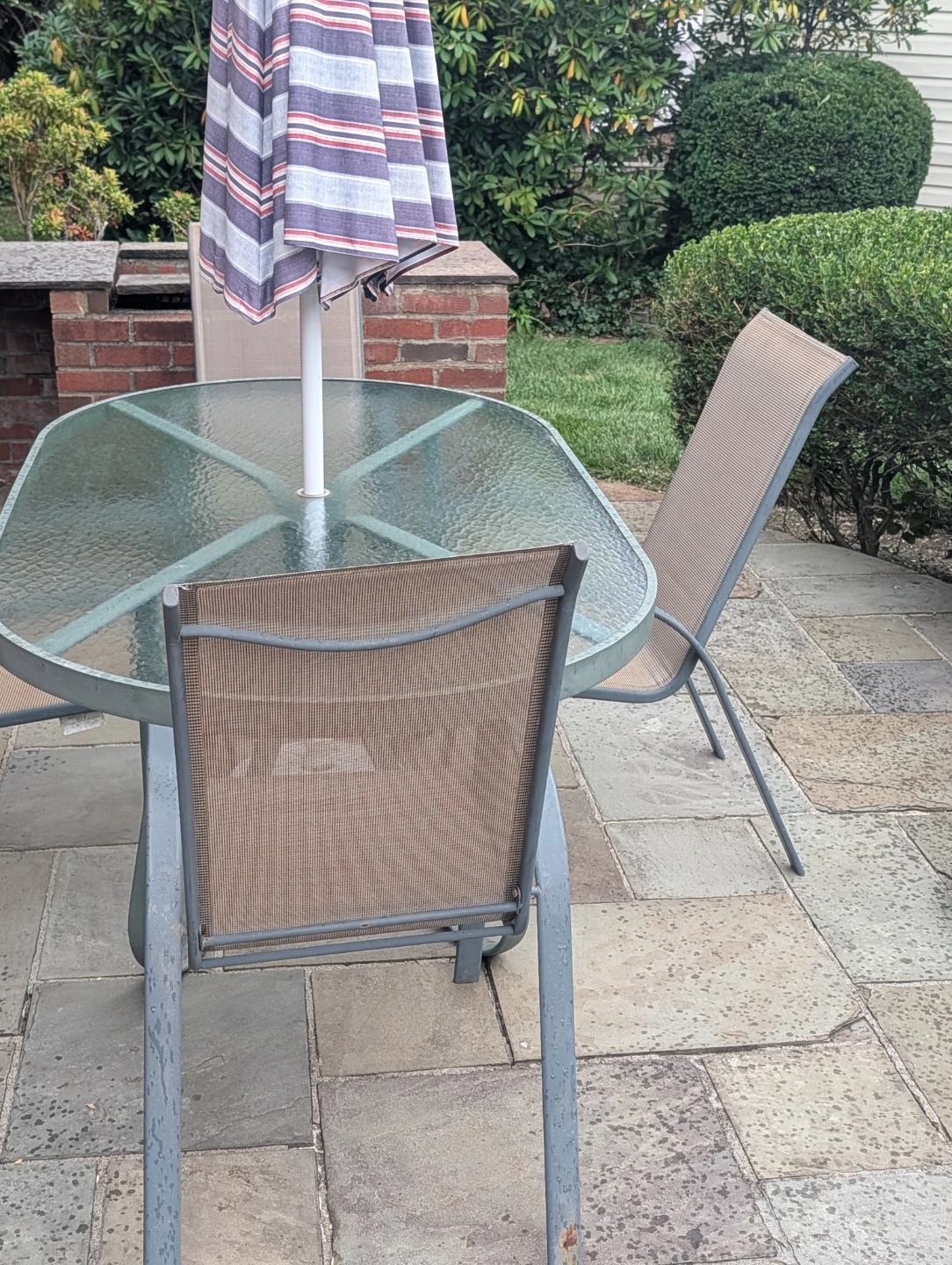 Glass Top Patio Dining Table with Chairs and Umbrella