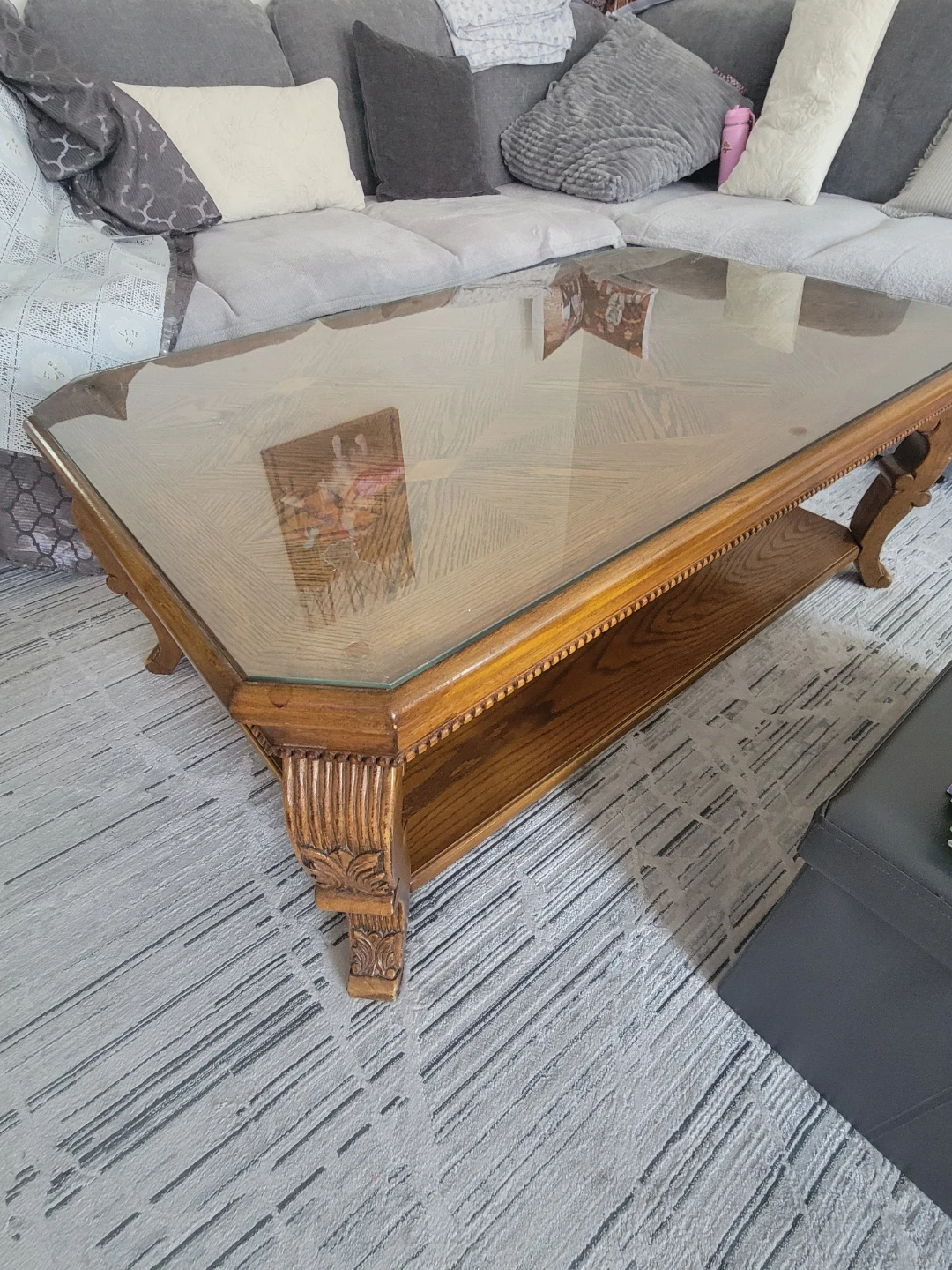 Wooden coffee table with glass top